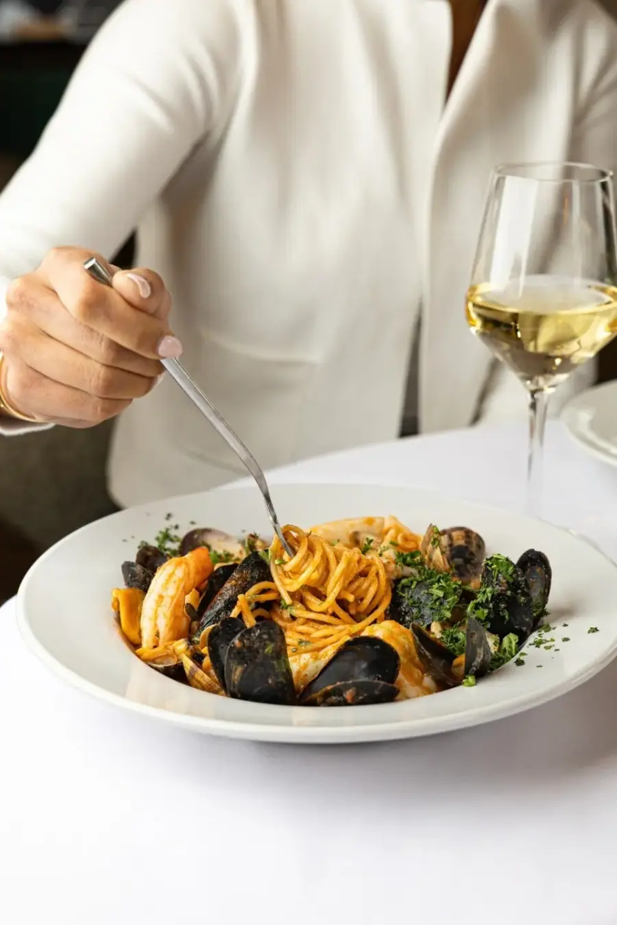A bowl of frutti di mare with fresh pasta